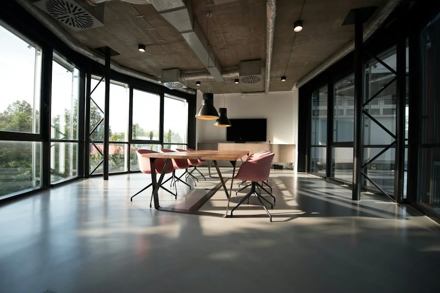 Illustrative workplace with desks and seating for office relocation planning